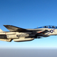 Armed with a laser-guided bomb and a LANTIRN targeting pot, a specially painted F-14D Tomcat assigned to the Blacklions of Fighter Squadron Two One Three (VF-213 conducts a mission over the Persian Gulf in 2005 (US Navy)